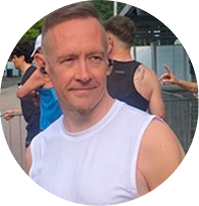 Dave before the half marathon, smiling at the start line